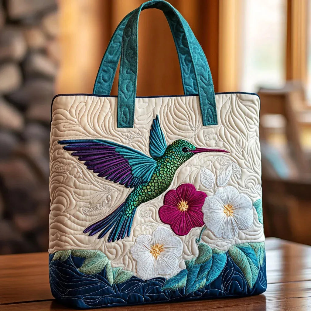 Borsa artigianale trapuntata con colibrì e fiore bianco