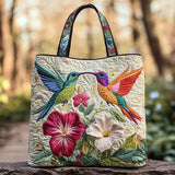 Borsa artigianale trapuntata con colibrì e fiori bianchi
